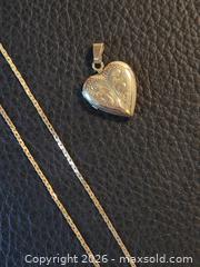 MaxSold Auction: 14k gold locket & 10k chain - Hamilton (Ontario, Canada) SELLER MANAGED Downsizing Online Auction - Cochrane Rd.