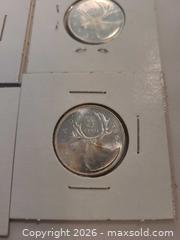 MaxSold Auction: 4x1964 unc. Cnd. .25c pcs. - Hamilton (Ontario, Canada) SELLER MANAGED Downsizing Online Auction - Cochrane Road