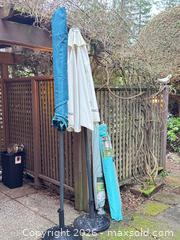 MaxSold Auction: Lot of Teal/Cream Patio Umbrellas with 3 Black Metal Bases - Surrey (British Columbia, Canada) SELLER MANAGED Estate Sale Online Auction -  16 Avenue