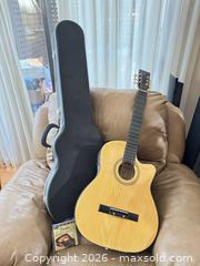 MaxSold Auction: Unknown Brand Acoustic-Electric Guitar Model V.A0001 Natural Top - Surrey (British Columbia, Canada) SELLER MANAGED Estate Sale Online Auction -  16 Avenue