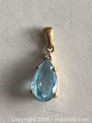MaxSold Auction: Pear-Shaped Blue Faceted Stone Pendant in Yellow Metal Setting – Stamped Bail - Toronto (Ontario, Canada) SUPER SHORT NOTICE PARTNER MANAGED Estate Sale Online Auction -  Wellington Street East (CONDO)