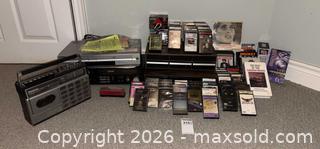 MaxSold Auction: DVD/VHS Player, Cassette Players and CDs/DVDs - Oakville (Ontario, Canada) PARTNER MANAGED Estate Sale Online Auction - Dorval Drive