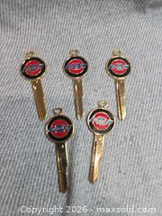 MaxSold Auction: Lot of 5 Vintage-Style Chevrolet Key Blanks - Uncut - San Jose (California, USA) SELLER MANAGED Downsizing Online Auction - North 24th Street