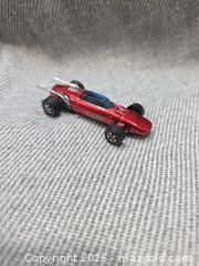 MaxSold Auction: Vintage 1969 Hot Wheels Redline "Indy Eagle" - Spectraflame Red (Hong Kong) - San Jose (California, USA) SELLER MANAGED Downsizing Online Auction - North 24th Street