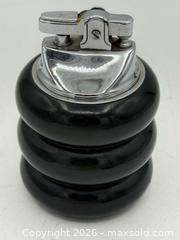 MaxSold Auction: Vintage Bradlow table lighter features a distinct Art Deco design with a black enameled - Menlo Park (California, USA) SELLER MANAGED Downsizing Online Auction - Henderson Place