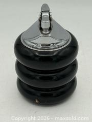 MaxSold Auction: Vintage Bradlow table lighter features a distinct Art Deco design with a black enameled - Menlo Park (California, USA) SELLER MANAGED Downsizing Online Auction - Henderson Place