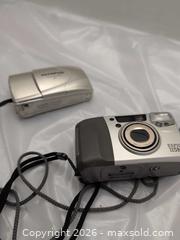 MaxSold Auction: 2 cameras - Victoria (British Columbia, Canada) SELLER MANAGED Reseller Online Auction - Island Highway