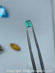 MaxSold Auction: GENUINE!! (0.16ct)  EMERALD CUT VIVID AAA COLOMBIAN EMERALD GEMSTONE! - Toronto (Ontario, Canada) PARTNER MANAGED Downsizing Online Auction - Queen Street East