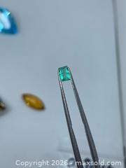 MaxSold Auction: GENUINE!! (0.16ct)  EMERALD CUT VIVID AAA COLOMBIAN EMERALD GEMSTONE! - Toronto (Ontario, Canada) PARTNER MANAGED Downsizing Online Auction - Queen Street East