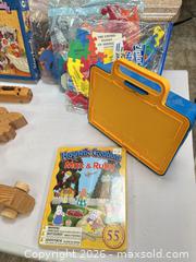 MaxSold Auction: Assorted Kids Lot: Board Books, Wooden Toys & Magnetic Set - Acme (Alberta, Canada) SELLER MANAGED Moving Online Auction - Township Road 292