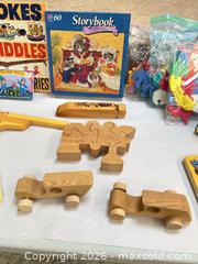 MaxSold Auction: Assorted Kids Lot: Board Books, Wooden Toys & Magnetic Set - Acme (Alberta, Canada) SELLER MANAGED Moving Online Auction - Township Road 292