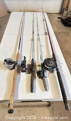 MaxSold Auction: Lot of 4 Fishing Rods and Reels, Mixed Types 6–7 ft - Acme (Alberta, Canada) SELLER MANAGED Moving Online Auction - Township Road 292