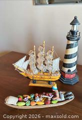 MaxSold Auction: Lot of 6–10 Decorative Model Sailboats, Lighthouses & Boats - Acme (Alberta, Canada) SELLER MANAGED Moving Online Auction - Township Road 292