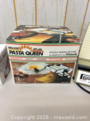 MaxSold Auction: Mixed Kitchen Cookware & Appliances: Dutch Oven, Pasta Maker, Slicer - Acme (Alberta, Canada) SELLER MANAGED Moving Online Auction - Township Road 292