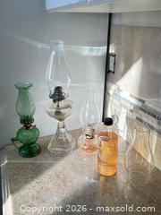 MaxSold Auction: Mixed Vintage Oil & Hurricane Lamps with Chimneys, Burners, Oil - Acme (Alberta, Canada) SELLER MANAGED Moving Online Auction - Township Road 292