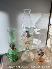 MaxSold Auction: Mixed Vintage Oil & Hurricane Lamps with Chimneys, Burners, Oil - Acme (Alberta, Canada) SELLER MANAGED Moving Online Auction - Township Road 292