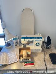 MaxSold Auction: Singer 5820 C Sewing Machine with Accessories - Acme (Alberta, Canada) SELLER MANAGED Moving Online Auction - Township Road 292