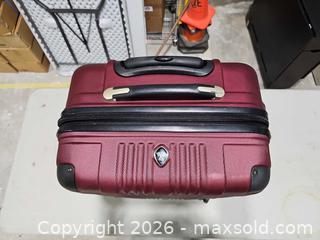 MaxSold Auction: Bellini Large Burgundy Hard-Shell Suitcase with 4 Spinner Wheels - Toronto (Ontario, Canada) PARTNER MANAGED Reseller Online Auction - Coldwater Road