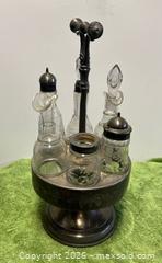 MaxSold Auction: This item is an antique Victorian etched glass and silverplate castor cruet set - Wheatland (New York, USA) SELLER MANAGED Downsizing Online Auction -  Briarwood Lane