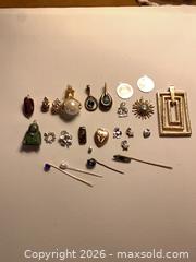 MaxSold Auction: Vintage Necklace and charm pendants and vintage hat pins - Tay Valley (Ontario, Canada) SELLER MANAGED Downsizing Online Auction - Clarchris Road