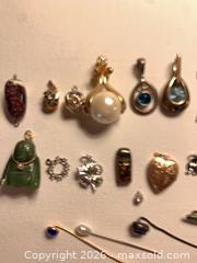 MaxSold Auction: Vintage Necklace and charm pendants and vintage hat pins - Tay Valley (Ontario, Canada) SELLER MANAGED Downsizing Online Auction - Clarchris Road