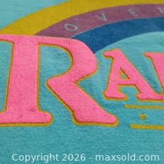 MaxSold Auction: Vintage 1990s Over the Rainbow Toronto Promo T-Shirt – Single Stitch – Double-Sided – Canada Made – XL – Blue Authentic 1990s Promotional Graphic Tee - Toronto (Ontario, Canada) SELLER MANAGED Reseller Online Auction - Esandar Drive (STORAGE)