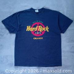 MaxSold Auction: Vintage 1998 Hard Rock Cafe Orlando T-Shirt – USA Made – X-Large – Excellent Condition – Blue Authentic 1998 Hard Rock Cafe Collectible - Toronto (Ontario, Canada) SELLER MANAGED Reseller Online Auction - Esandar Drive (STORAGE)