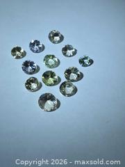 MaxSold Auction: Amazing untreated Tanzanite lot  - Hamilton (Ontario, Canada) PARTNER MANAGED Reseller Online Auction - Mohawk Road West,