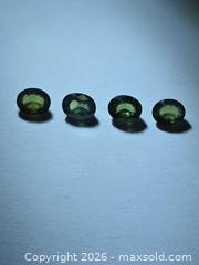 MaxSold Auction: Natural AAA green sapphire lot  - Hamilton (Ontario, Canada) PARTNER MANAGED Reseller Online Auction - Mohawk Road West,