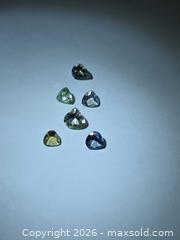 MaxSold Auction: Natural rare untreated Tanzanite lot - Hamilton (Ontario, Canada) PARTNER MANAGED Reseller Online Auction - Mohawk Road West,