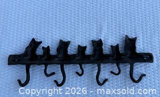 MaxSold Auction: Cast iron cats key or coat hanger - Nanaimo (British Columbia, Canada) SELLER MANAGED Estate Sale Online Auction - Elizabeth Street