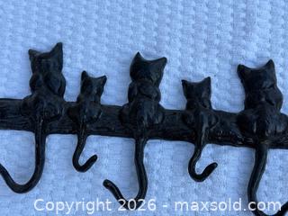 MaxSold Auction: Cast iron cats key or coat hanger - Nanaimo (British Columbia, Canada) SELLER MANAGED Estate Sale Online Auction - Elizabeth Street