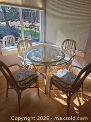 MaxSold Auction: 4-Chair Rattan Dining Set with Floral Cushions - Saanich (British Columbia, Canada) PARTNER MANAGED Downsizing Online Auction - Gordon Point Drive