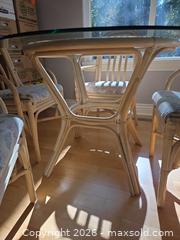 MaxSold Auction: 4-Chair Rattan Dining Set with Floral Cushions - Saanich (British Columbia, Canada) PARTNER MANAGED Downsizing Online Auction - Gordon Point Drive