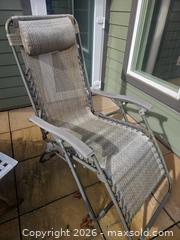 MaxSold Auction: Gray Zero Gravity Lounge Chair, Folding, Outdoor, Head Pillow - Saanich (British Columbia, Canada) PARTNER MANAGED Downsizing Online Auction - Gordon Point Drive