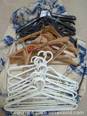 MaxSold Auction: Mixed Wood & Plastic Adult Coat Hangers (Approx. 20–35) - Saanich (British Columbia, Canada) PARTNER MANAGED Downsizing Online Auction - Gordon Point Drive