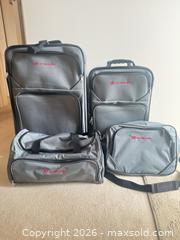 MaxSold Auction: Outbound 4-Piece Gray Soft-Sided Luggage Set - Saanich (British Columbia, Canada) PARTNER MANAGED Downsizing Online Auction - Gordon Point Drive