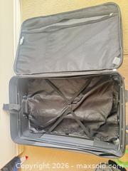 MaxSold Auction: Outbound 4-Piece Gray Soft-Sided Luggage Set - Saanich (British Columbia, Canada) PARTNER MANAGED Downsizing Online Auction - Gordon Point Drive