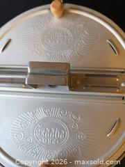 MaxSold Auction: Pro Popper Aluminum Popcorn Maker with Wooden Handles - Saanich (British Columbia, Canada) PARTNER MANAGED Downsizing Online Auction - Gordon Point Drive