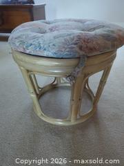 MaxSold Auction: Rattan Chair and Footstool Set with Floral Cushions - Saanich (British Columbia, Canada) PARTNER MANAGED Downsizing Online Auction - Gordon Point Drive