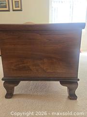 MaxSold Auction: Solid Wood Cedar Chest with Carved Front & Lock - Saanich (British Columbia, Canada) PARTNER MANAGED Downsizing Online Auction - Gordon Point Drive
