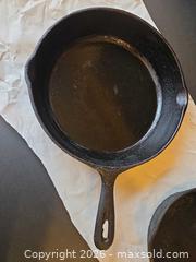 MaxSold Auction: Two Cast Iron Pans, 10" and 8" - Saanich (British Columbia, Canada) PARTNER MANAGED Downsizing Online Auction - Gordon Point Drive