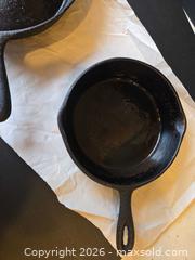 MaxSold Auction: Two Cast Iron Pans, 10" and 8" - Saanich (British Columbia, Canada) PARTNER MANAGED Downsizing Online Auction - Gordon Point Drive
