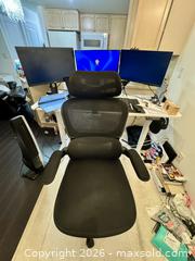 MaxSold Auction: ULTIMATE WFH SETUP - Standing Desk + 2 Monitors + Ergonomic Chair + Remote Setup - Toronto (Ontario, Canada) SELLER MANAGED Moving Online Auction - Yonge Street (CONDO)