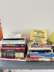 MaxSold Auction: Lot: Multiple Cookbooks with Tea Cozy, Red Silicone Bakeware & Cookie Tin - Greater Sudbury (Ontario, Canada) PARTNER MANAGED Moving Online Auction - Regent Street (CONDO)