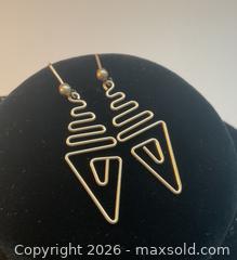 MaxSold Auction: 14K gold abstract dangle earrings (1.31 grams) - Ottawa (Ontario, Canada) SELLER MANAGED Downsizing Online Auction - Tall Forest Drive