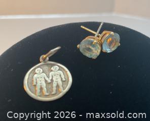 MaxSold Auction: 14K gold earrings with light blue stone and 10K gold charm of children holding hands - Ottawa (Ontario, Canada) SELLER MANAGED Downsizing Online Auction - Tall Forest Drive