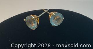 MaxSold Auction: 14K gold earrings with light blue stone and 10K gold charm of children holding hands - Ottawa (Ontario, Canada) SELLER MANAGED Downsizing Online Auction - Tall Forest Drive