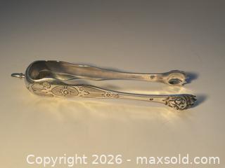 MaxSold Auction: 1878-1880s  French sterling silver sugar tongs with lions feet - Ottawa (Ontario, Canada) SELLER MANAGED Downsizing Online Auction - Tall Forest Drive