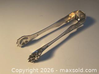 MaxSold Auction: 1878-1880s  French sterling silver sugar tongs with lions feet - Ottawa (Ontario, Canada) SELLER MANAGED Downsizing Online Auction - Tall Forest Drive